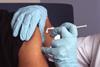 750px-Nurse_administers_a_vaccine