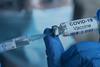 COVID-19_Vaccine_vial_and_syringe_-_US_Census