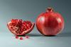 Pomegranate_fruit_-_whole_and_piece_with_arils
