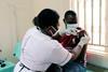 Low-Res_First PrEPVacc volunteer receives his injections and medicines at the launch of the launch of the PrePVacc Trial at the Masaka site