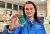 Low-Res_Dr Despina Moschou with LoCKAmp replaceable lab on chip printed circuit board