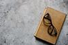Old_glasses_on_old_book_from_above