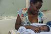 Young_mum_-_Mphatso_Gumulira,_15,_with_her_son_Zayitwa_(7497760554)