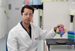 Low-Res_Dr Ariel Isaacs and the model of DS90 nanobody on a Nipah virus fusion protein