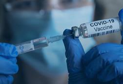 COVID-19_Vaccine_vial_and_syringe_-_US_Census