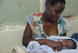 Young_mum_-_Mphatso_Gumulira,_15,_with_her_son_Zayitwa_(7497760554)