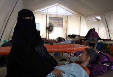 A-mother-accompanies-her-child-receiving-care-at-the-diarrhea-treatment-centre