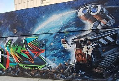 Wall-e_graffiti_on_hoardings_at_the_former_Civic_Centre,_Plymouth,_Devon_-_November_2023_(2)
