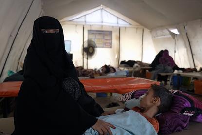 A-mother-accompanies-her-child-receiving-care-at-the-diarrhea-treatment-centre