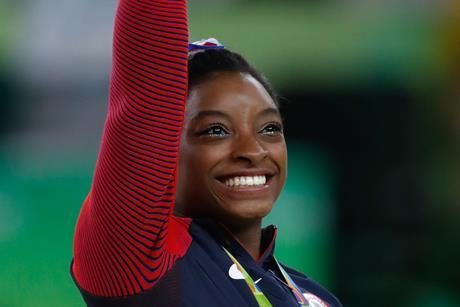Simone_Biles_at_the_2016_Olympics_all-around_gold_medal_podium_(28262782114)_cropped