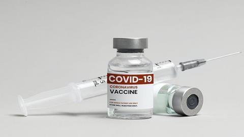 Low-Res_Michael July 2 COVID vaccine in vial