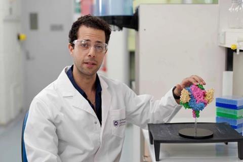 Low-Res_Dr Ariel Isaacs and the model of DS90 nanobody on a Nipah virus fusion protein