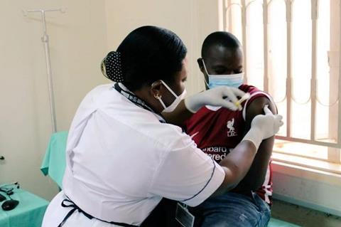 Low-Res_First PrEPVacc volunteer receives his injections and medicines at the launch of the launch of the PrePVacc Trial at the Masaka site