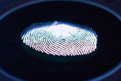 glowing fingerprint on electronic device