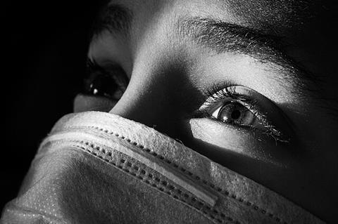 Boy_wearing_a_mask_during_COVID-19