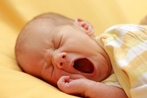 Yawning infant