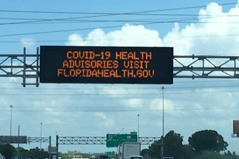 COVID-19_health_advisories_sign_on_Florida_Highway