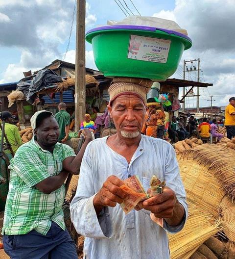 Sachet_water_seller_in_Lagos_Nigeria